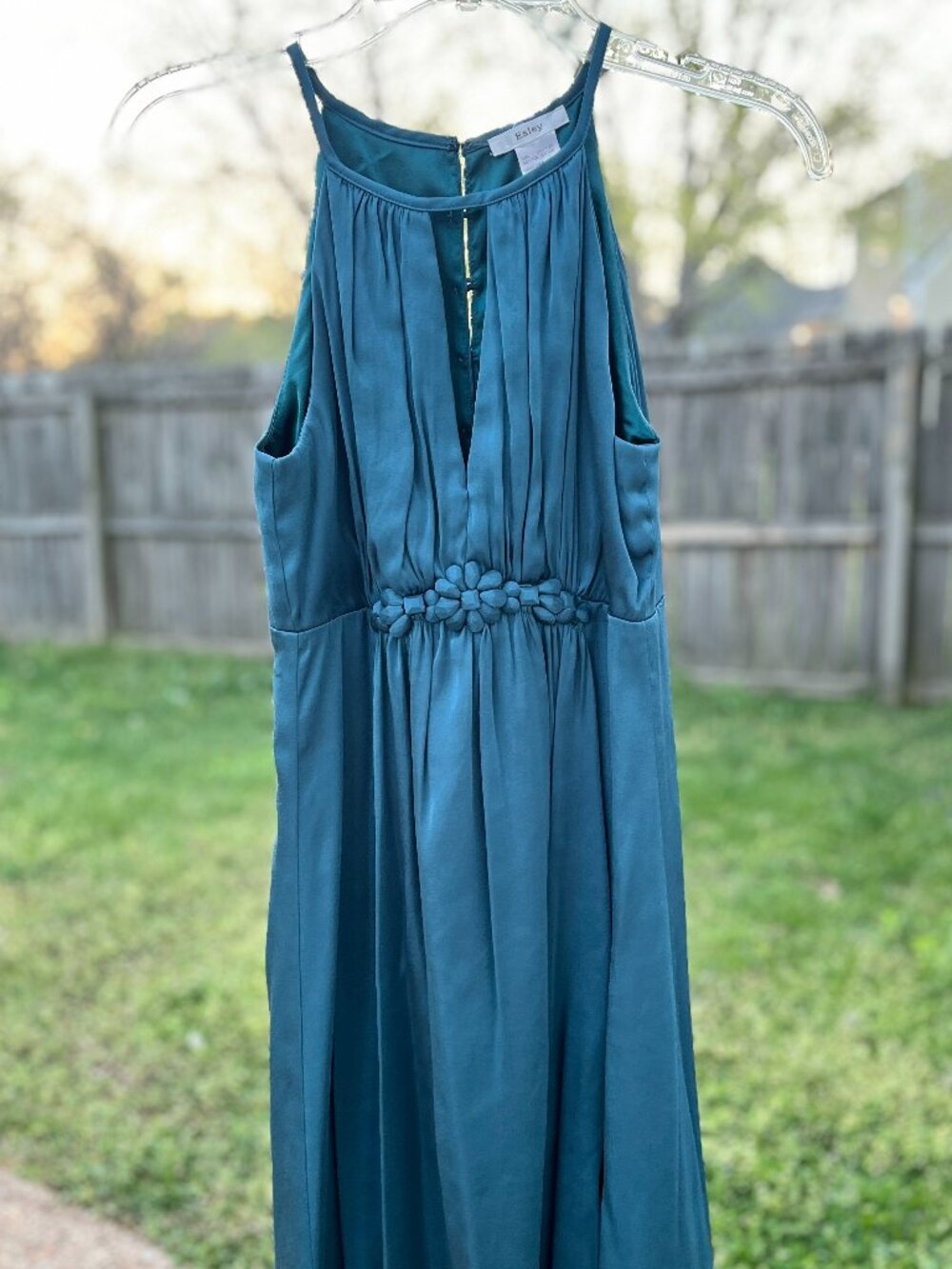 Esley teal green dress featuring a deep V-neck and braided waistband